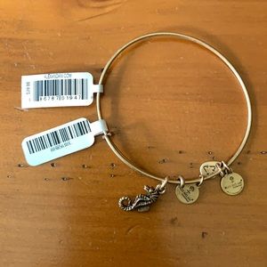 Alex and Ani seahorse expandable wire bangle gold finish.